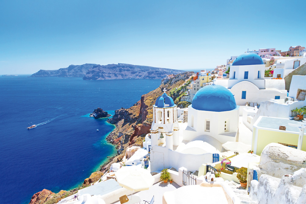 Greece-Santorini-blue-churches-view_shutterstock_132953783